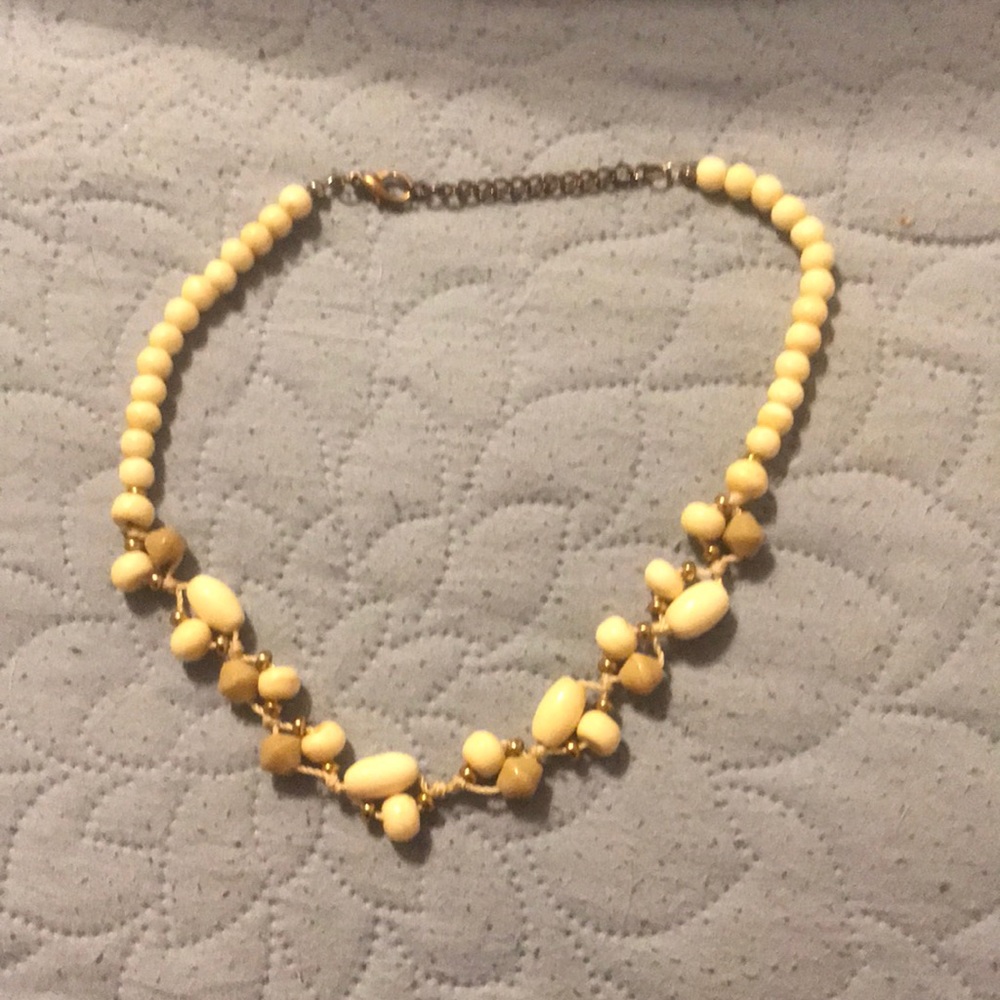 Ivory color beads and gold tone  necklace